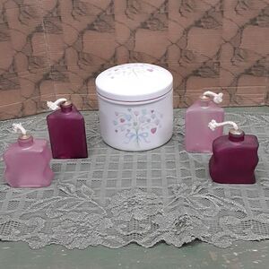‎Boutique style cannister and set of 4 oil candles